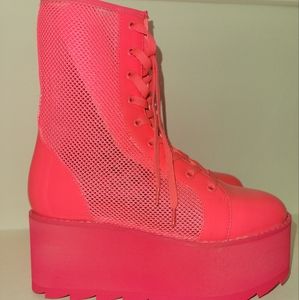 Neon hot pink platform boots